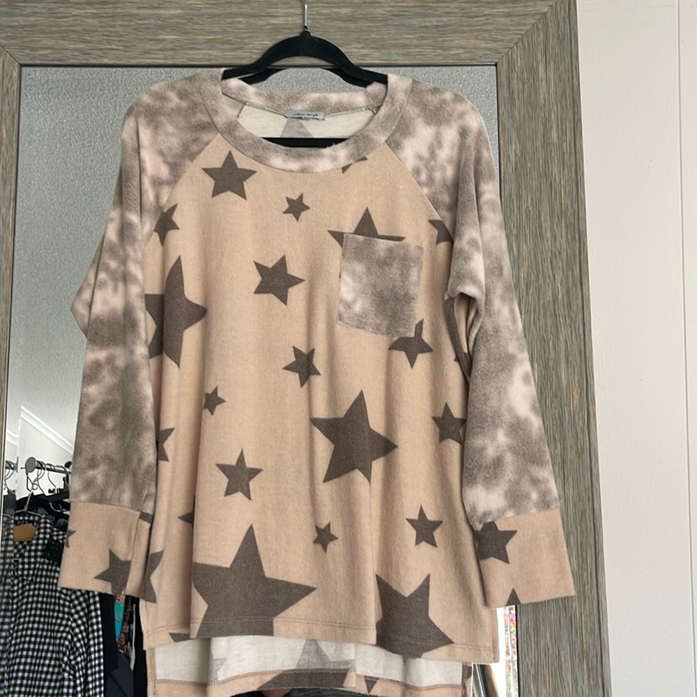 Soft and so comfortable top size medium never been worn
